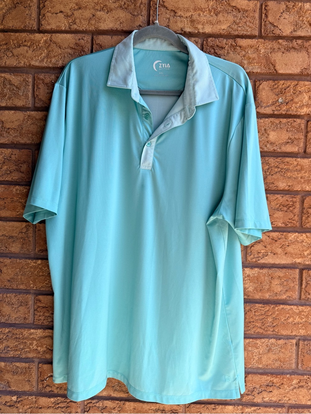 4/$25 • Zyia Active Men’s Aqua Performance Polo